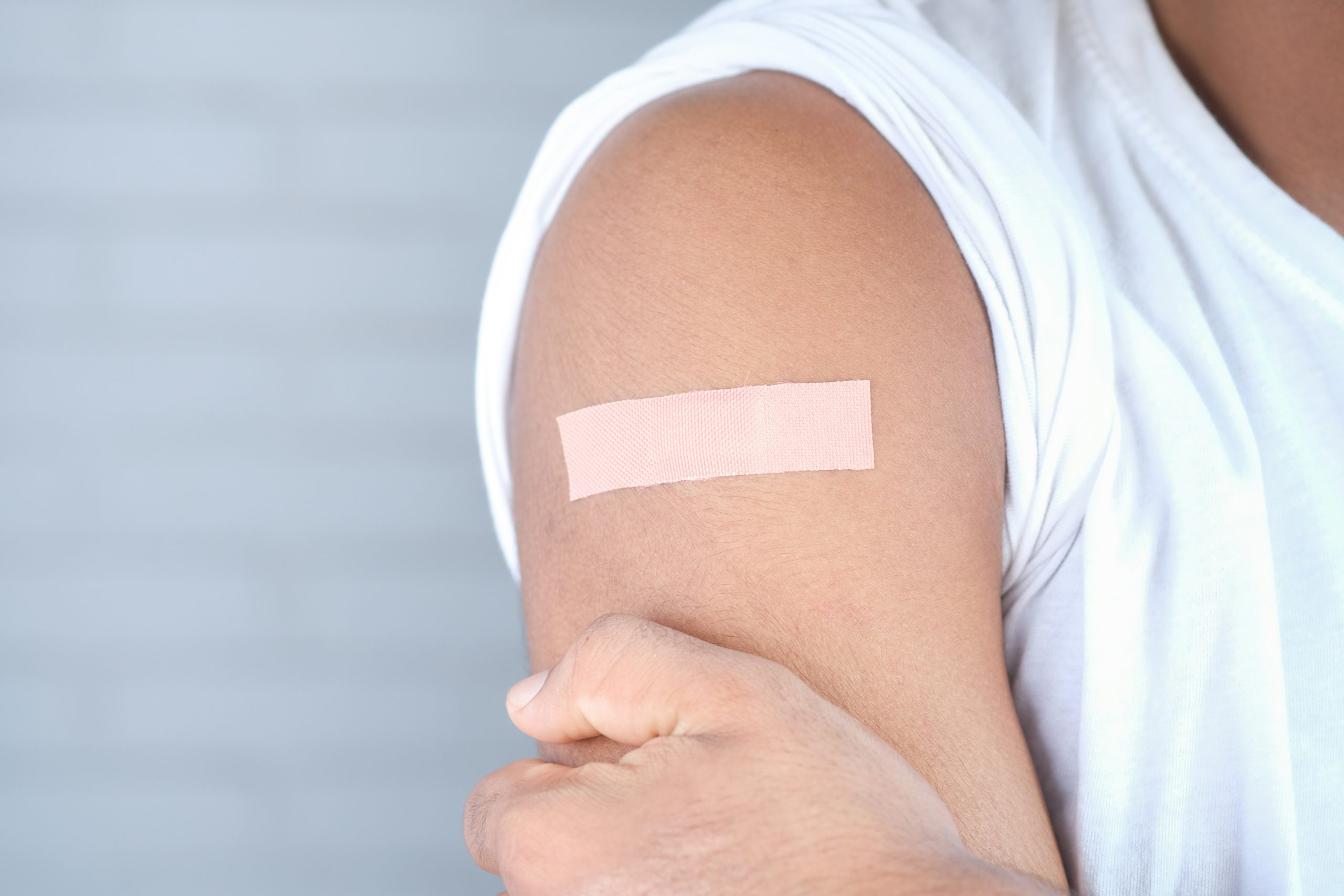 Vaccinatie arm met pleister